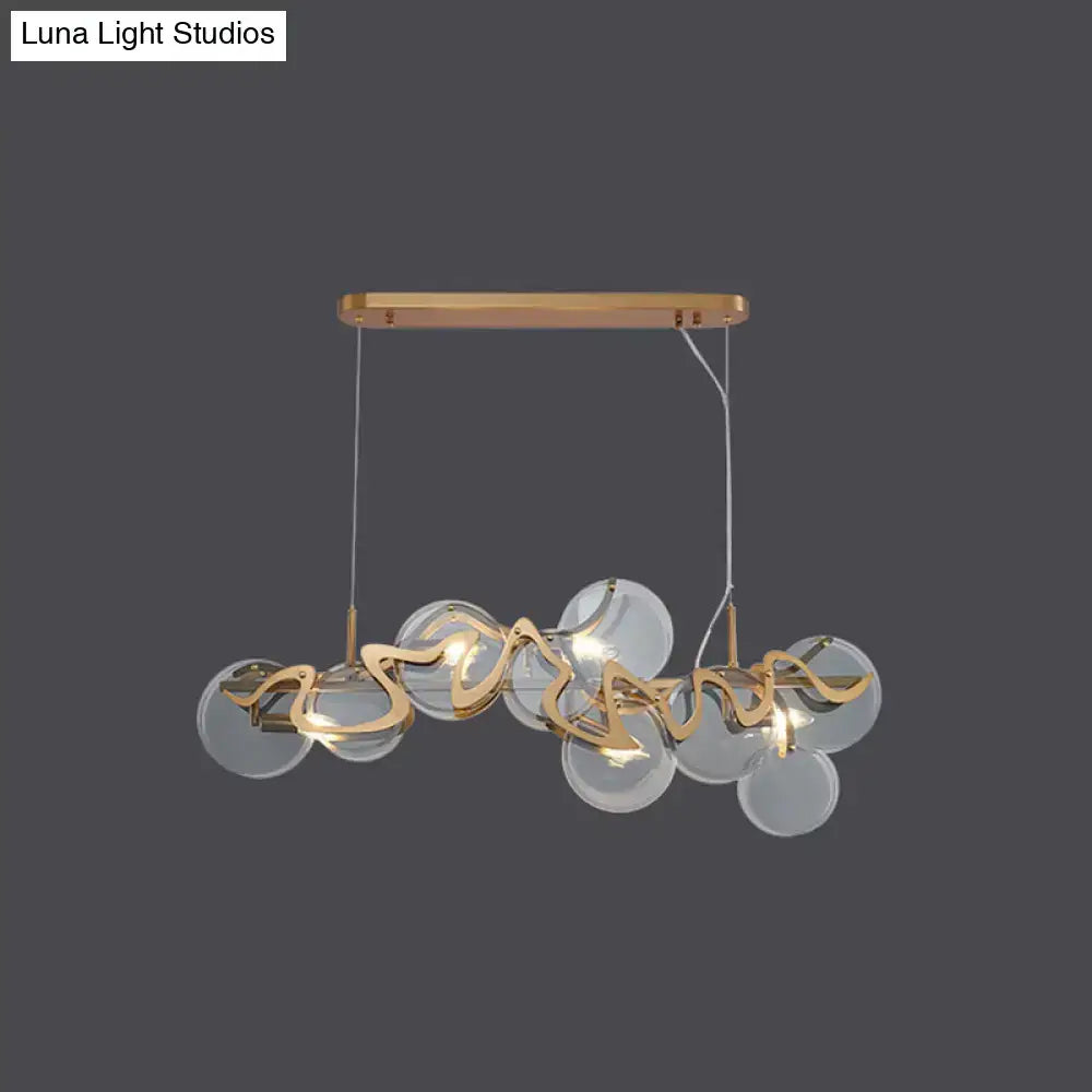 Decorbites postmodern circle pendant light with gold brass arms and glass spheres on wooden ceiling mount light fixture