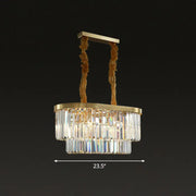 Gold-toned postmodern oblong island light with two tiers of clear crystal rods and sculptural brass chains for dining room