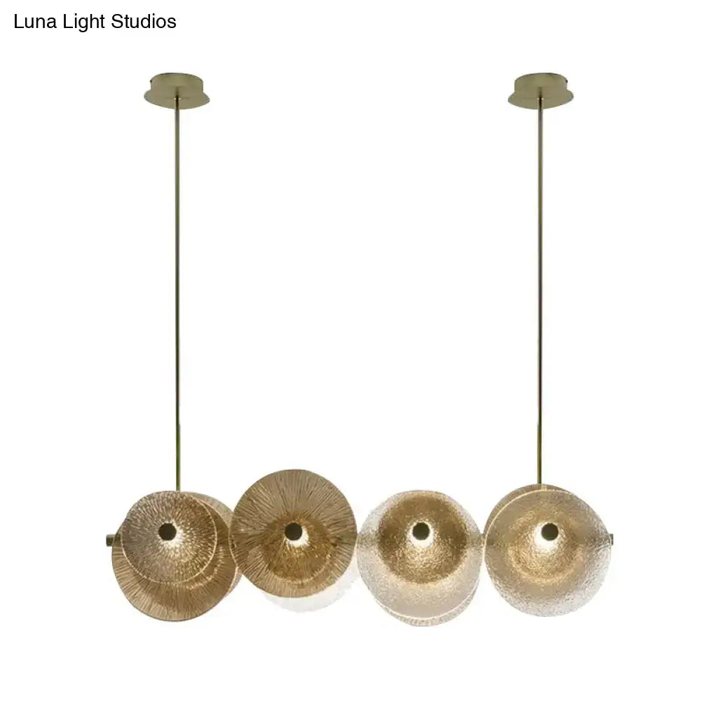 Gold-toned brass decorbites postmodern disc pendant light with four textured glass shades for 110v-120v or 220v-240v use