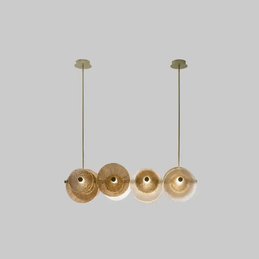 Gold-toned decorbites™ postmodern disc textured glass pendant lights with slender rods for 110v-120v or 220v-240v use