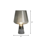 DecorBites postmodern glass table light with smoke gray translucent shade and cement base featuring metallic accent band