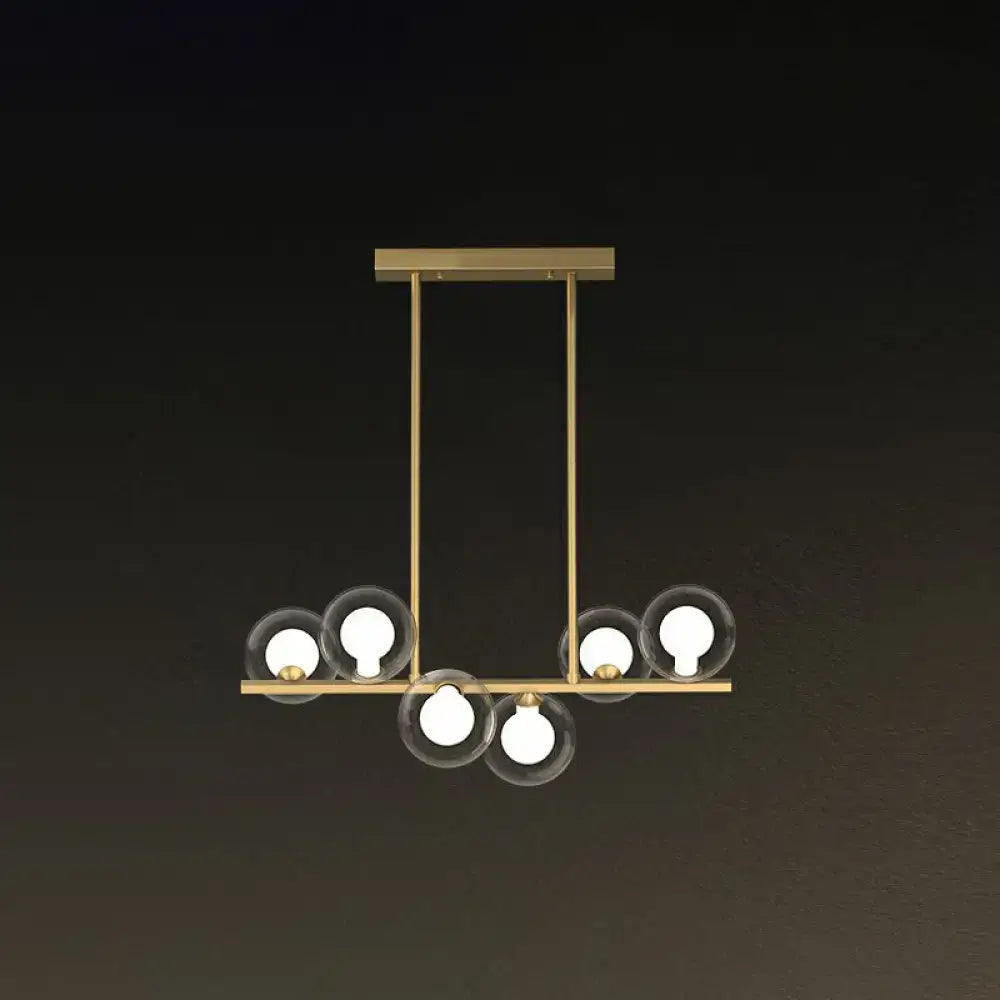 DecorBites™ postmodern led island light fixture with modern brass frame and five clear glass globe shades