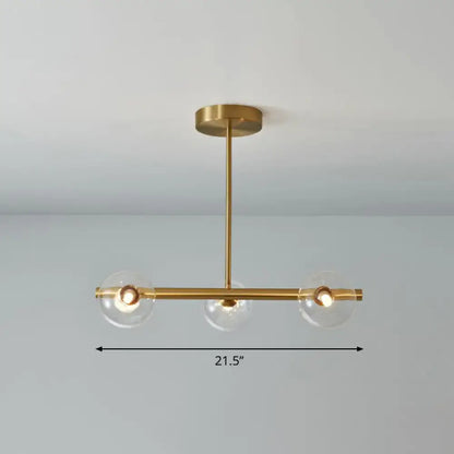 DecorBites™ postmodern linear island lamp pendant light in brass with three clear glass globes for dining room use