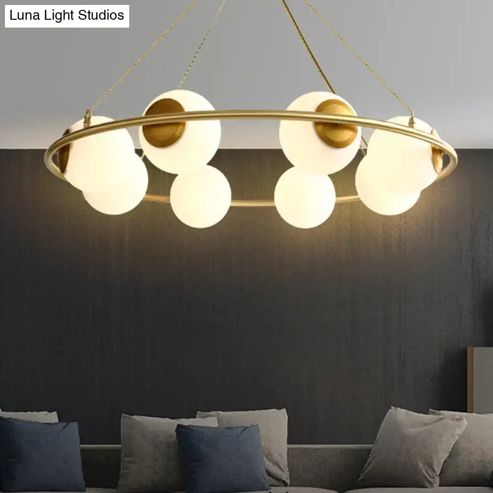 Decorbites™ postmodern circular chandelier light with frosted glass shades and brass finish metal frame