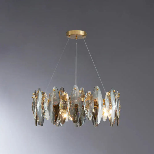 A modern postmodern smoke grey glass chandelier with gold ceiling mount and crystal slices for 220v-240v use