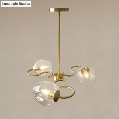 Brass finished semi-flush mount chandelier with three clear glass globes and curved organic arms for bedroom e12 e14