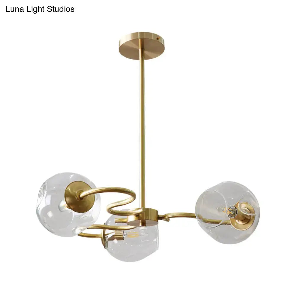 Gold-toned DecorBites™ semi-flush mount chandelier with three clear glass globes and e12 e14 bulb compatibility in brass