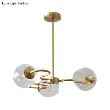 Gold-toned DecorBites™ semi-flush mount chandelier with three clear glass globes and e12 e14 bulb compatibility in brass