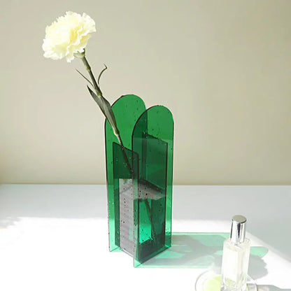 Emerald green translucent glass flower vase with modern geometric arches in nordic style decorbites rainbow color design
