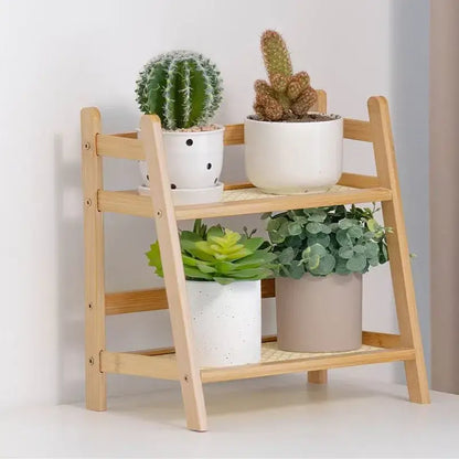 Light-colored wooden decorbites rattan 2-tier desktop organizer shelf with slanted sides and natural wood grain finish