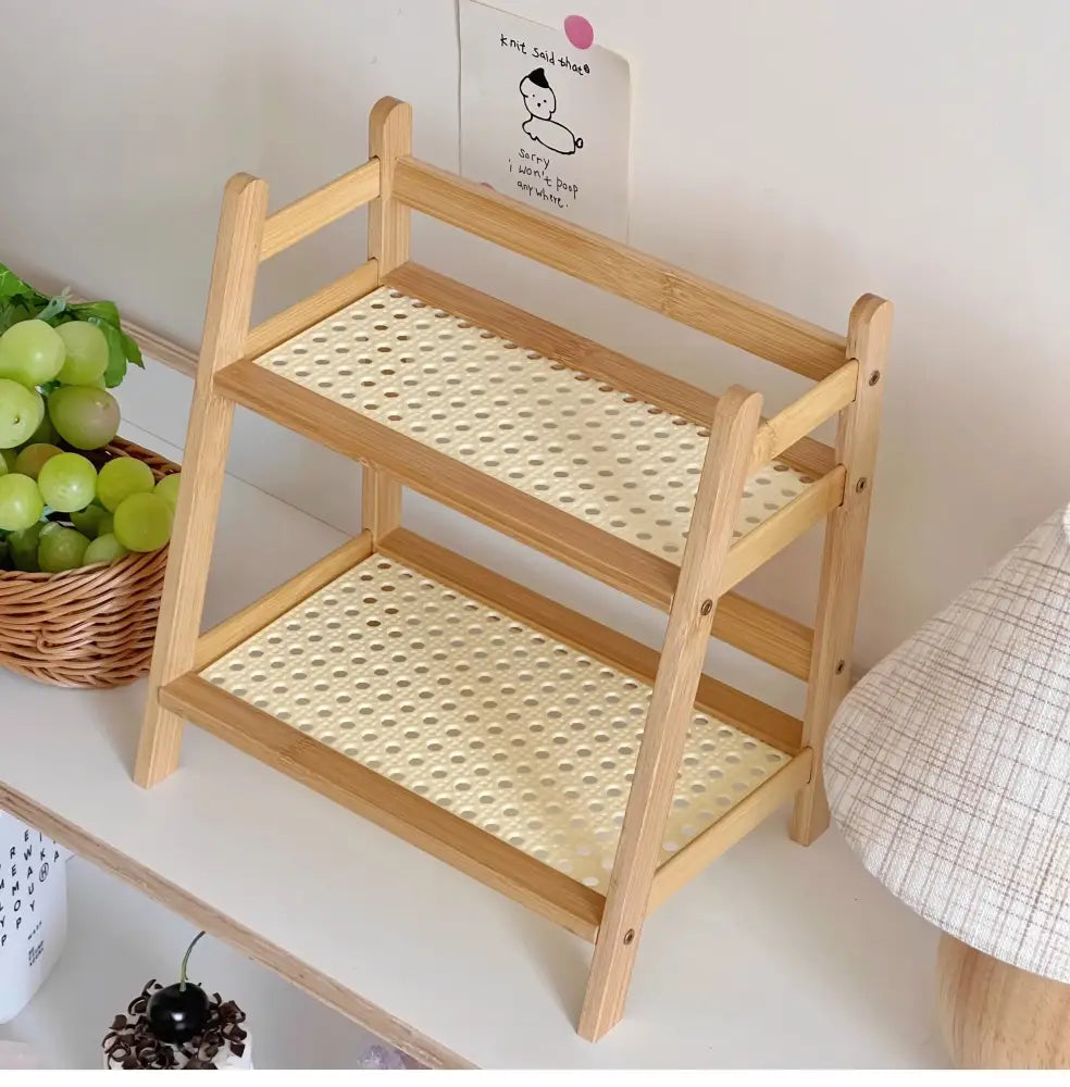 Light wood two-tier desktop organizer shelf with perforated beige woven rattan panels by decorbites for office use