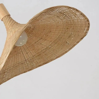 DecorBites™ rattan pendant light with natural woven rattan shade, wooden handle, and exposed bulb inside