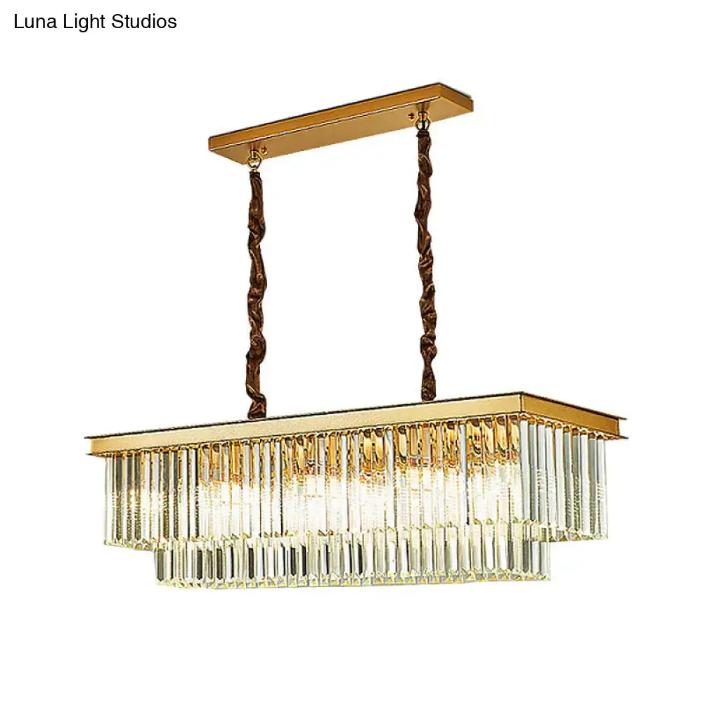 Gold-finished rectangular DecorBites pendant light with cascading clear glass prisms and twisted bronze chains for living room black gold decor