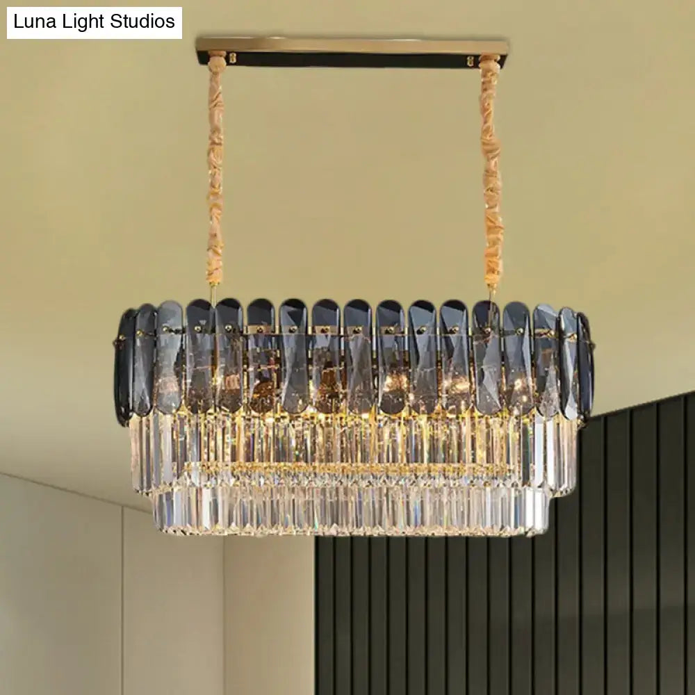 Elegant two-tiered rectangular dining room pendant with dark blue smoke gray and clear crystal elements suspended by twisted cords