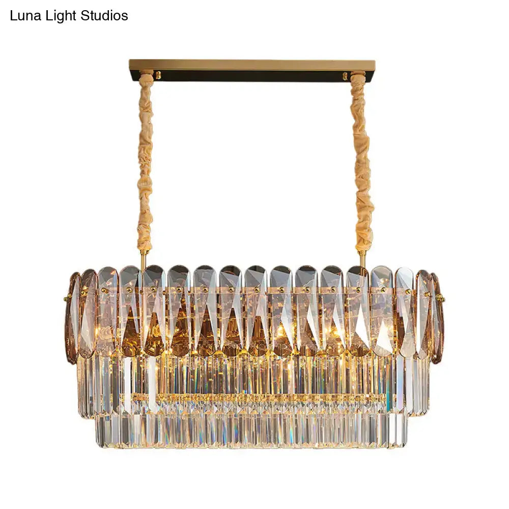 Gold-toned decorbites rectangular dining room pendant with 3-tier amber and smoke gray crystal prisms and twisted rope cords