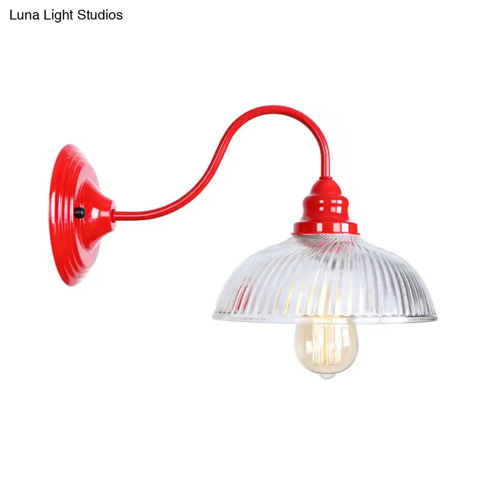 Vintage red metal wall sconce light with curved arm and ribbed glass shade for living room decor