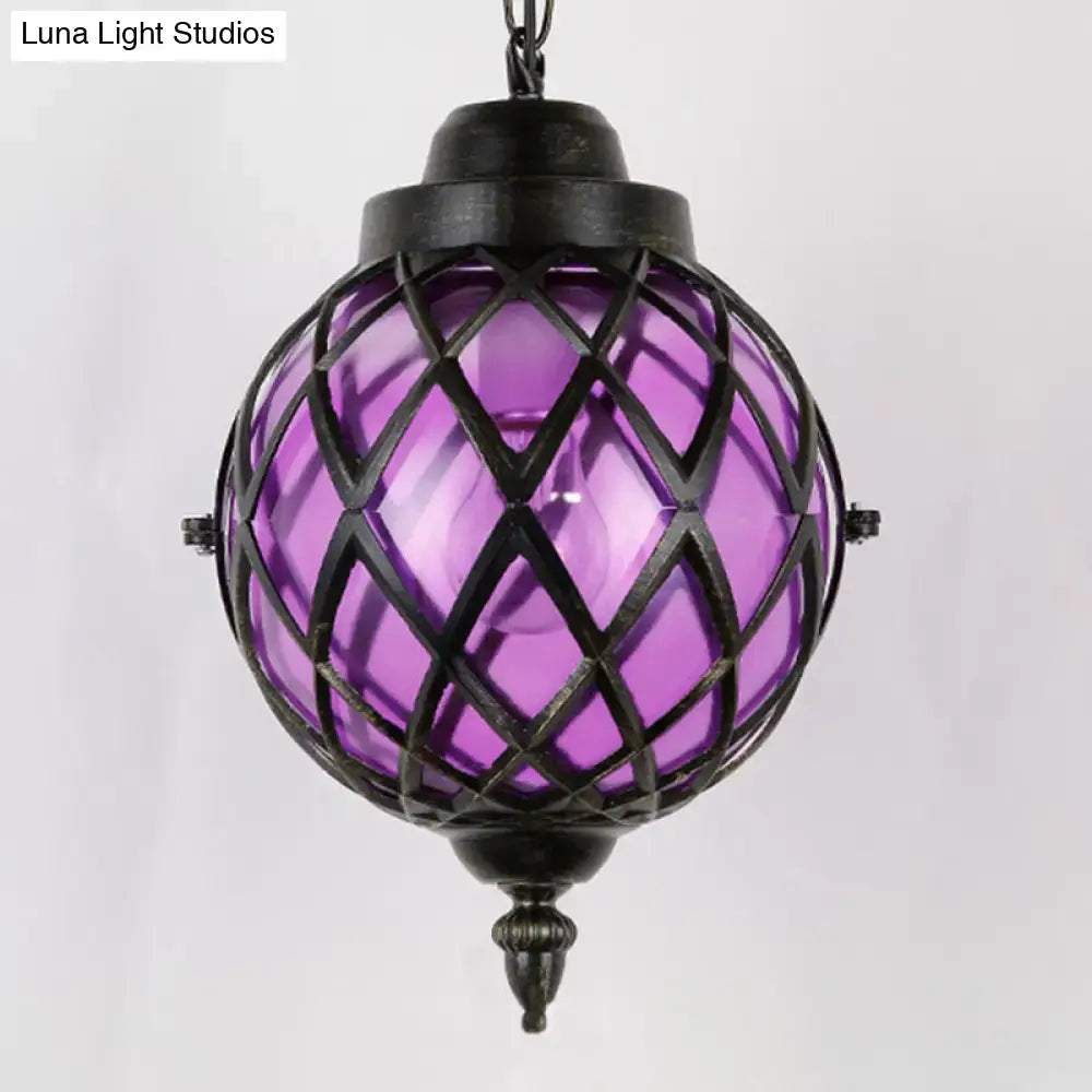 Decorbites restaurant pendant lighting featuring purple glass shade with black metal lattice ceiling light design