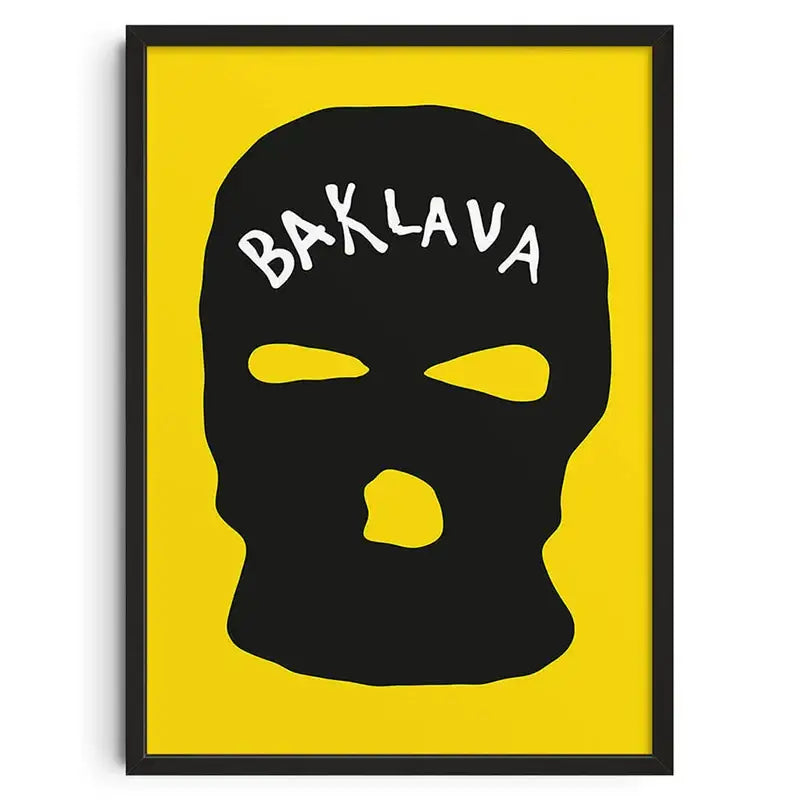 Decorbites™ retro abstract canvas print featuring a black ski mask with bold yellow cutouts in a sleek black frame