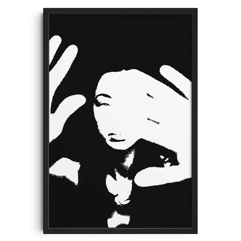 Black-framed canvas print wall art featuring a retro abstract stylized portrait of a woman in white by DecorBites™