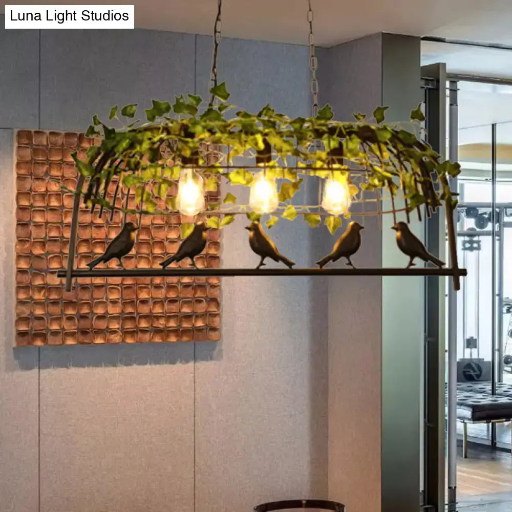 Wrought iron black decorbites retro birdcage island light fixture with green ivy and five bronze bird sculptures