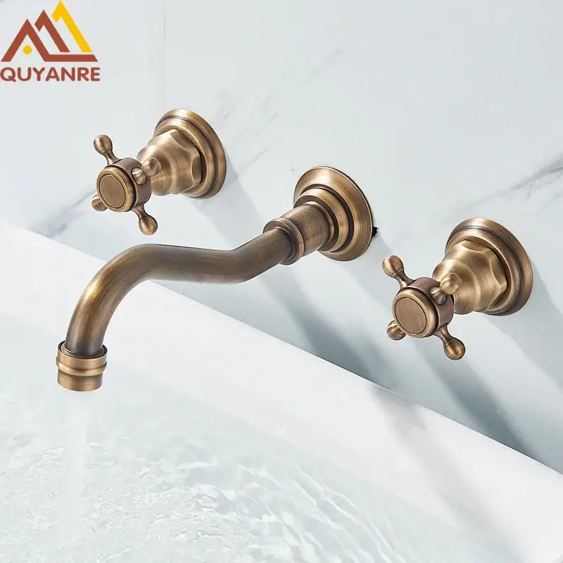 DecorBites™ retro color wall mounted bathroom faucet in antique brass finish with dual cross-shaped handles and curved spout