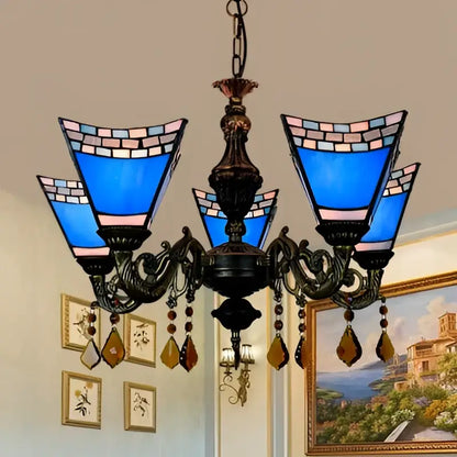 DecorBites retro geometric stained glass chandelier with blue yellow glass, ornate metal arms, and amber crystal pendants