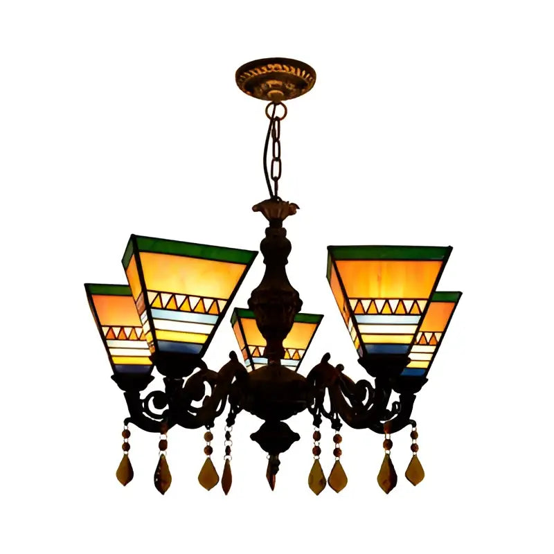 Antique bronze DecorBites™ chandelier with stained glass yellow blue geometric shades and crystal pendants for bedroom