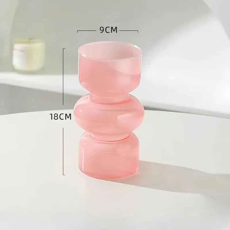 Decorbites™ retro glass vase is a translucent pink glass vase with a modern stacked design for flower arrangements