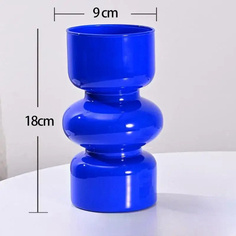 DecorBites™ retro glass vase in vibrant cobalt blue with glossy finish and stacked rounded tiers for flower arrangements