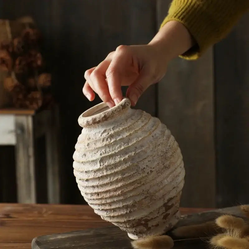 DecorBites™ retro handmade off-white ceramic vase with textured ribbed surface and slightly chipped rim for home decor