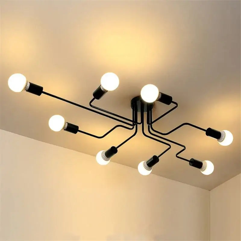 Black metal DecorBites™ retro industrial wrought iron ceiling light with eight exposed bulbs in modern branching design