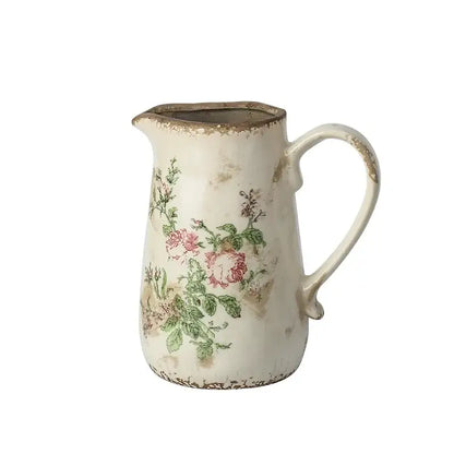 Antique-style white ceramic vase with pink floral decals and rustic finish in decorbites retro nordic ceramic style