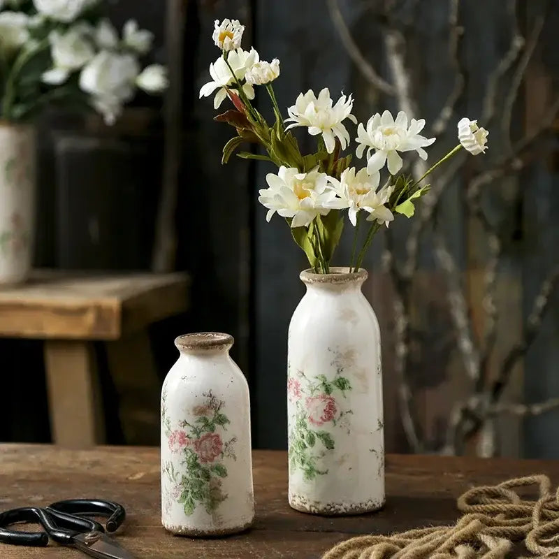 DecorBites™ retro nordic ceramic vases in white with pink and green floral decals and rustic distressed finish