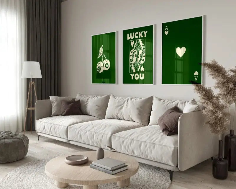Three framed green hearts canvas paintings from decorbites™ retro queen of hearts posters set above sofa