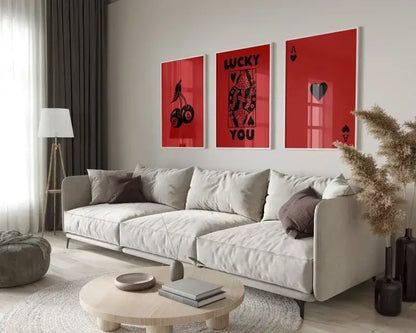 Modern beige sectional sofa with plush cushions alongside decorbites™ retro queen of hearts canvas wall art set