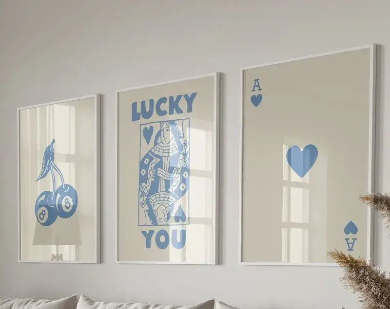 Set of three decorbites™ retro queen of hearts wall art prints featuring blue and cream hearts canvas designs