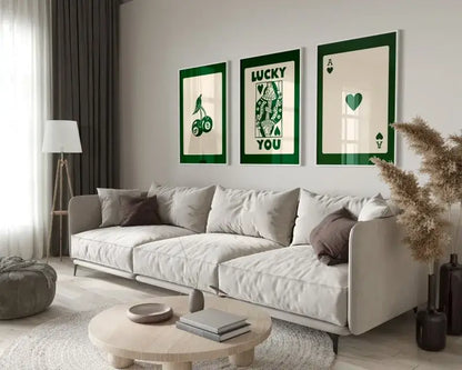 DecorBites™ retro queen of hearts wall art set features three framed green and cream hearts canvas artworks above sofa