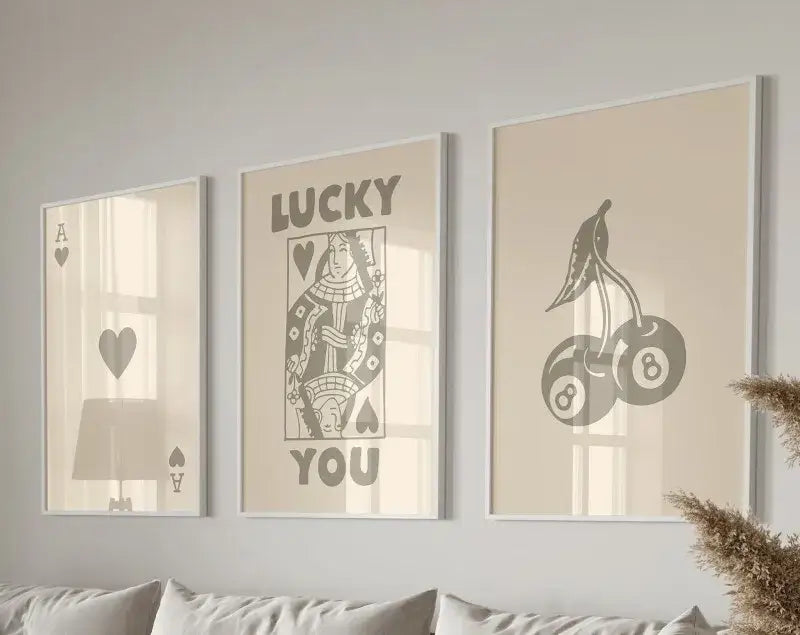 Three framed wall art set featuring retro queen of hearts canvas with minimalist gray illustrations on beige backgrounds