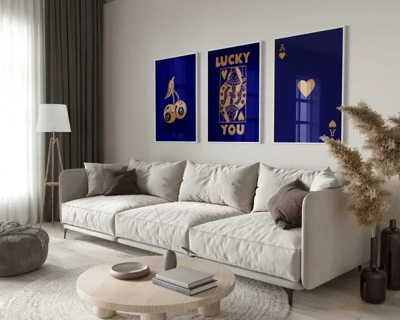 White sectional sofa with beige and brown throw pillows paired with decorbites retro queen of hearts hearts canvas wall art set