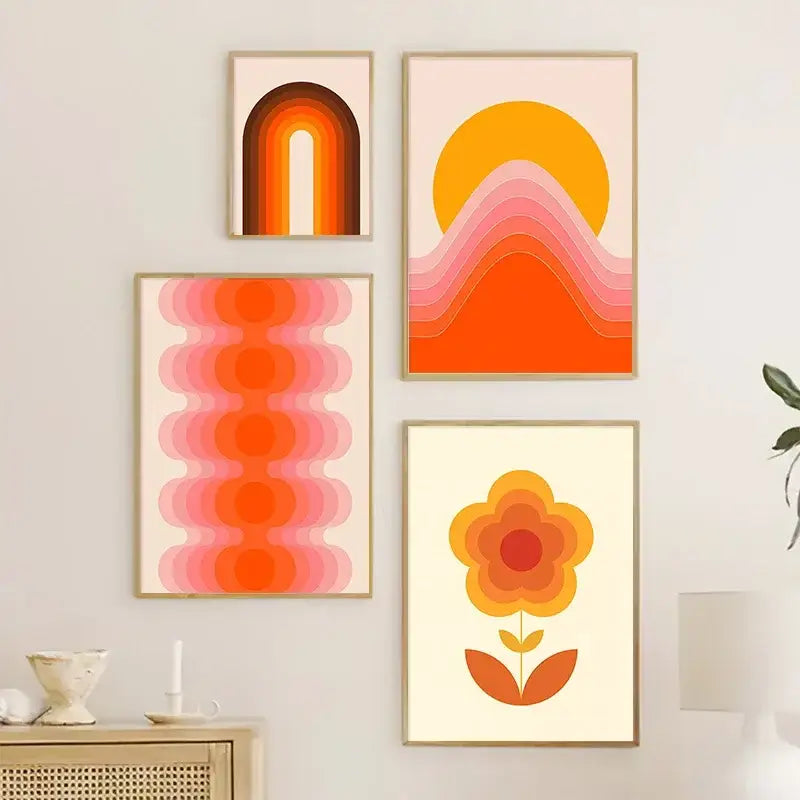 Set of four framed DecorBites retro stripes art prints with warm orange pink and yellow gradients for living room