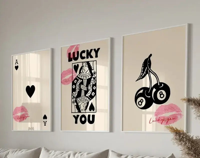 Three framed retro wall art posters set by decorbites featuring black and pink playing card designs on cream background