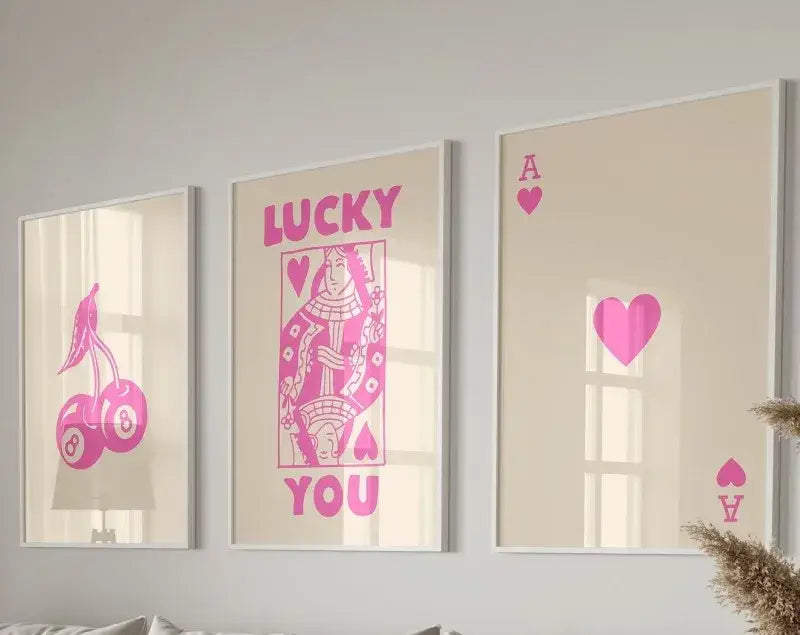 Three framed decorbites™ retro wall art posters set featuring pink playing card designs on beige background
