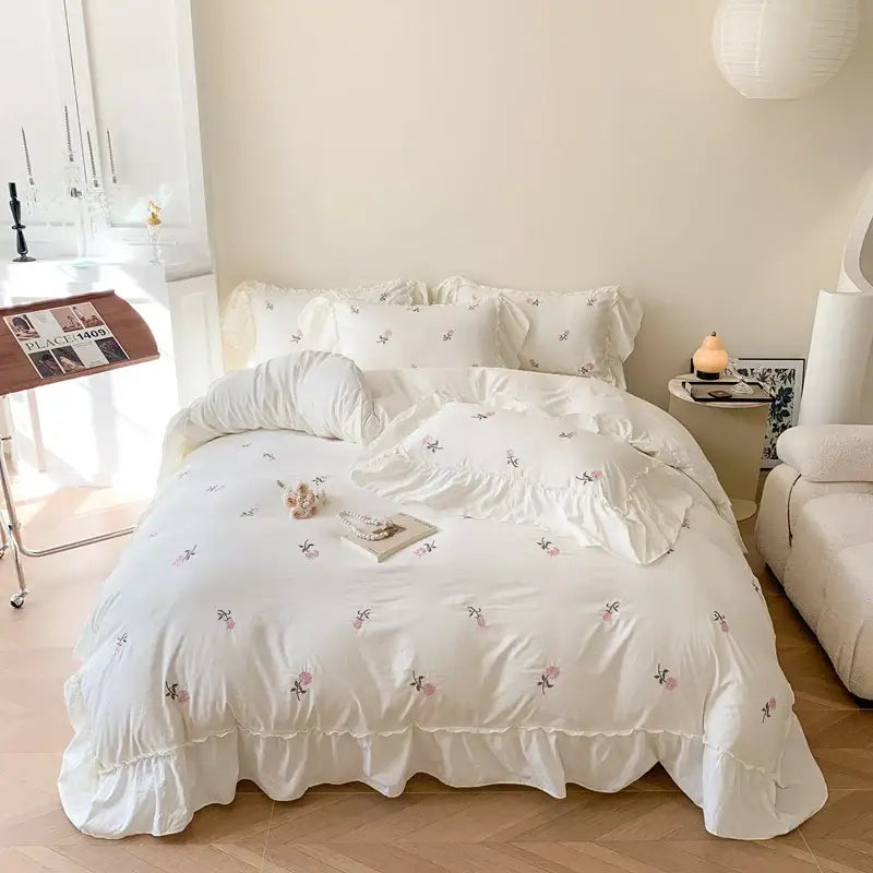 Decorbites™ rose embroidered duvet cover set in white with delicate pink blossoms and ruffled edges princess style