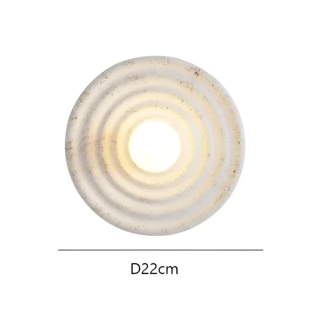 Rustic white ceramic decorbites round circle wall lamp with concentric ridges and central illuminated opening