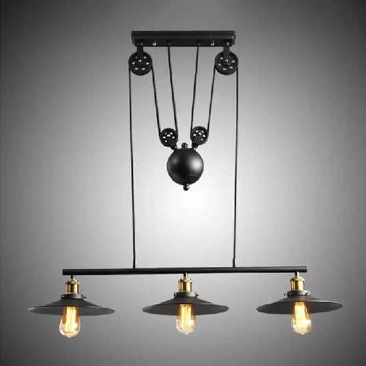 Industrial-style DecorBites™ rustic 3-head pendant light with black flared shade and pulley system for dining room island