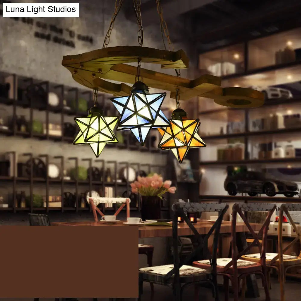 DecorBites rustic black star hanging chandelier with metal chain features three geometric glass shades in green blue amber
