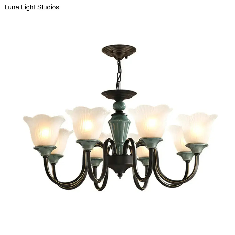 Antique bronze-finished DecorBites™ rustic floral chandelier with blackish green suspension and frosted glass shades