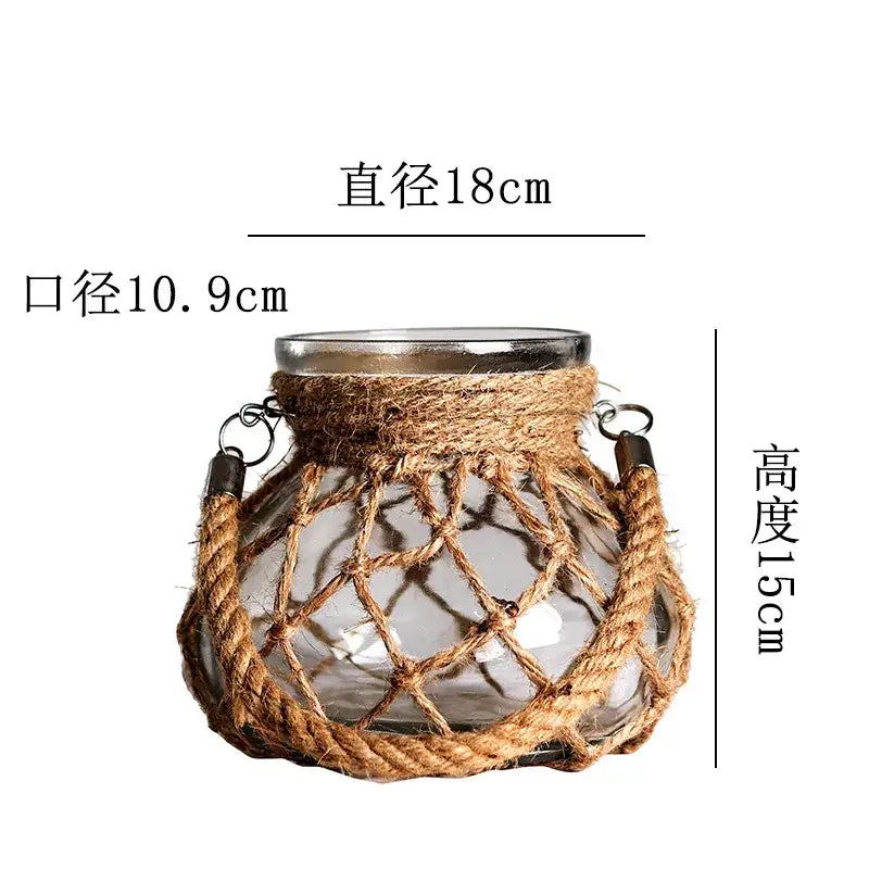 DecorBites™ rustic hanging glass vase with clear glass holder wrapped in natural hemp rope and metal rings for hanging