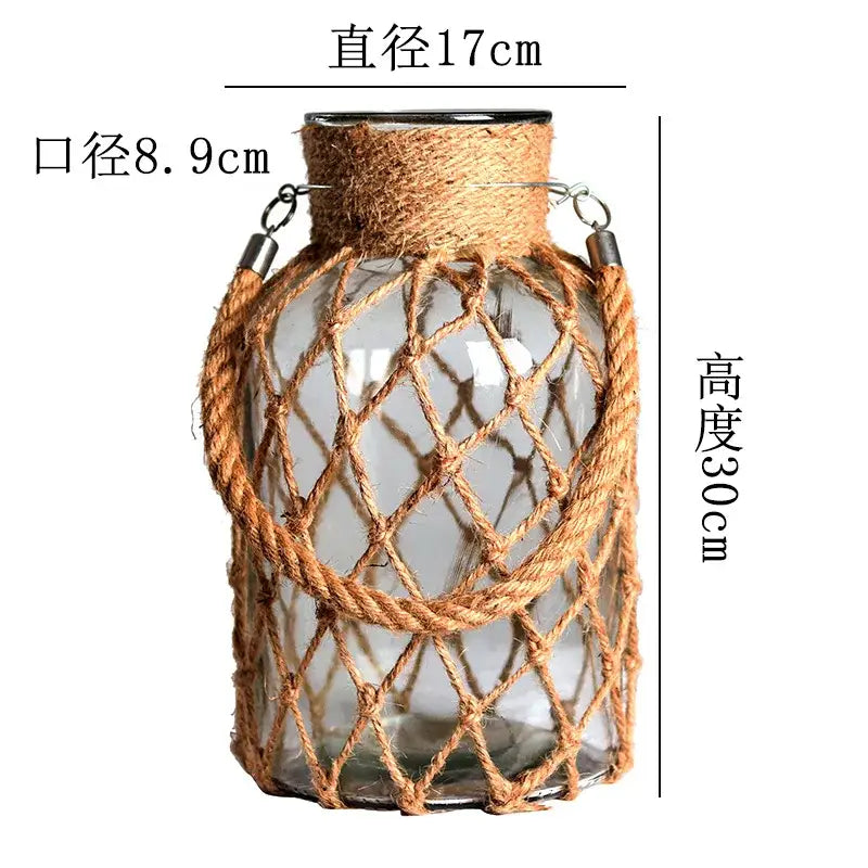 DecorBites™ rustic hanging glass vase with clear glass, natural hemp rope, woven twine, and metal rings for hanging