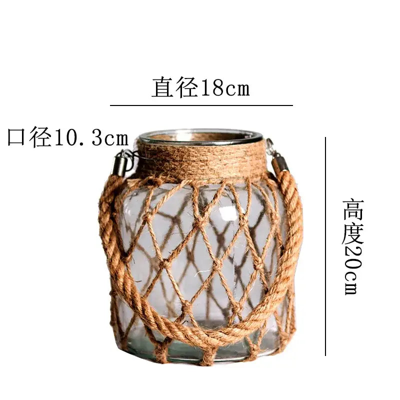 DecorBites rustic hanging glass vase with clear glass, woven hemp rope netting, and metal hardware accents
